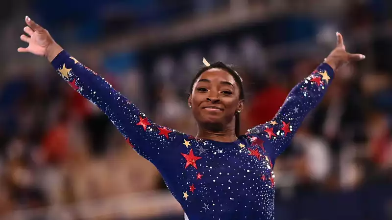 Simone Biles was recommended a coloring book for children on the plane.