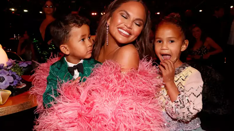 Chrissy Teigen's son Miles accidentally pulls out Luna's tooth while playing