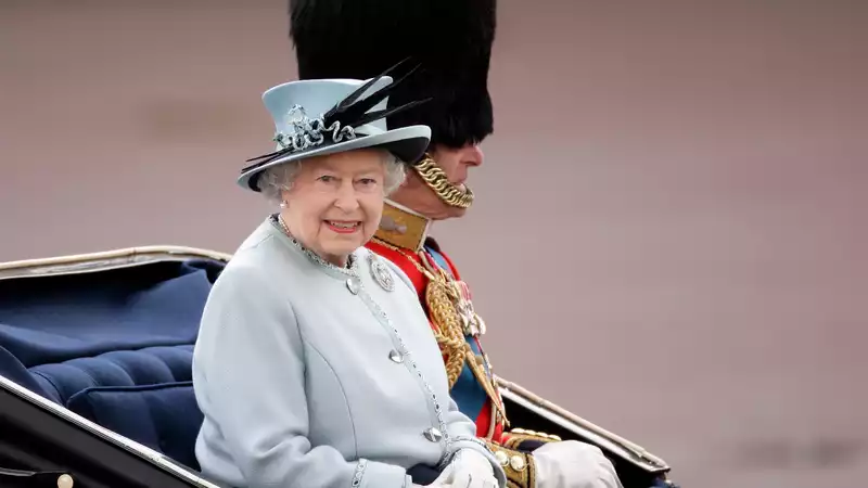 For the first time in 70 years, the Queen does not salute in "Trooping the Colour."