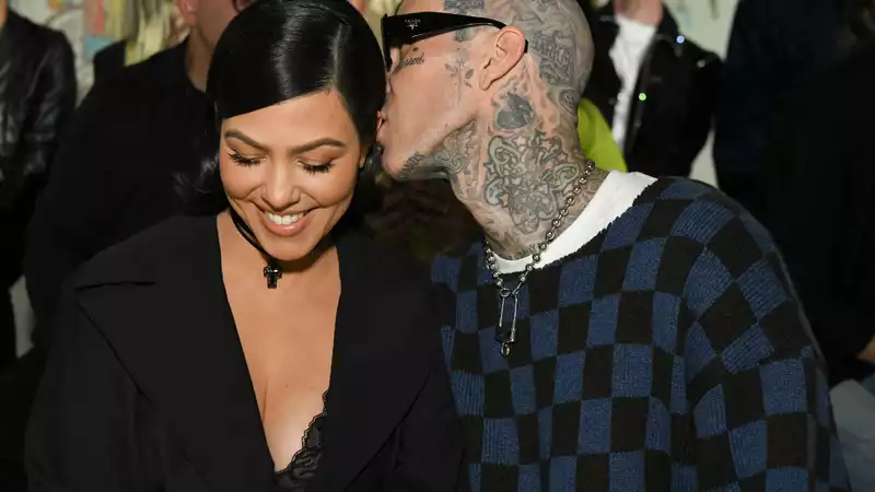 Kourtney Kardashian and Travis Barker's love "will continue to run deep," tarot reader suggests.