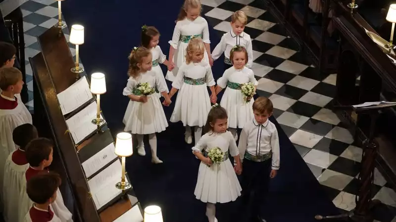 Prince George, Princess Charlotte, and Prince Louis in a carriage at the Queen's Jubilee