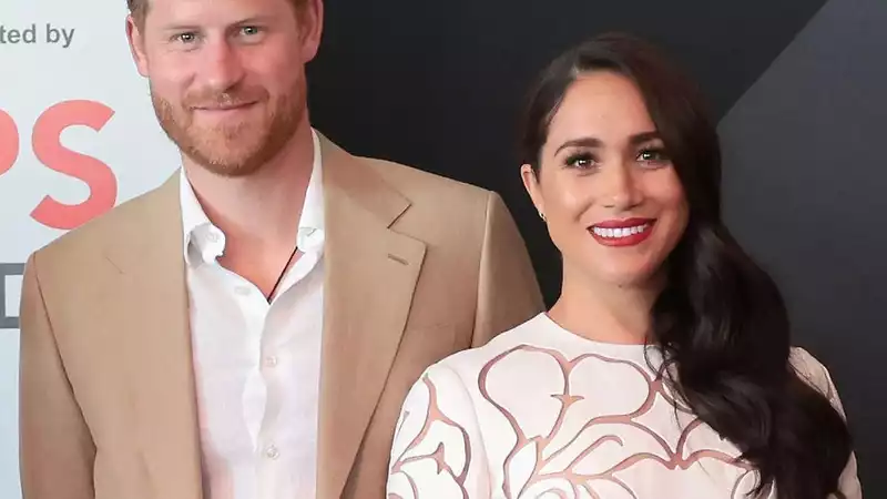 Meghan Markle's White Outfit at The Hague is 'Message of Peace and Unity,' Experts Say