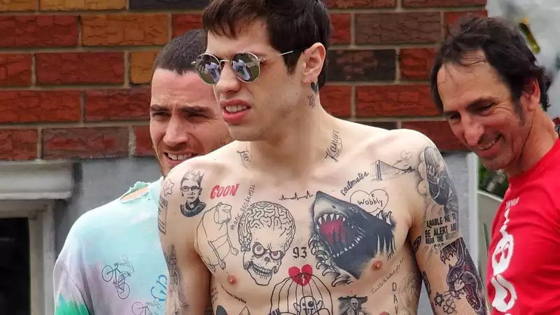 Pete Davidson burns Kim Kardashian's name on his chest and other "cute" tattoos for her