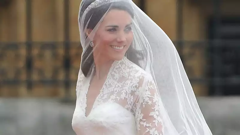 Kate Middleton reportedly "wept at the palace" as her wedding dress designer was revealed.