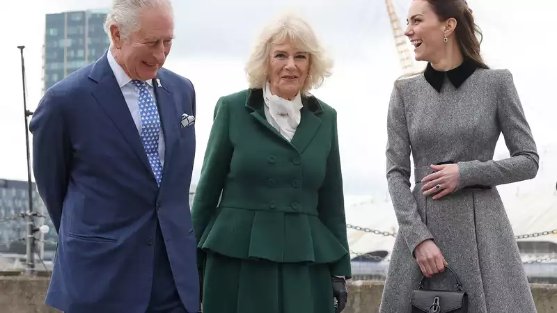 Kate Middleton laughs with Prince Charles and Camilla Parker-Bowles, who are engaged to be married.