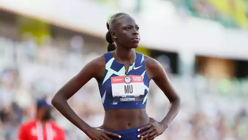 Who is Olympic 800-meter star Assing Mou?