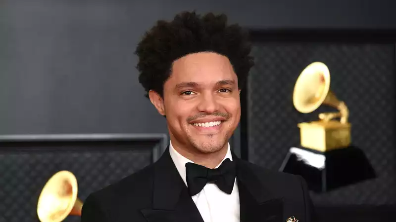 Trevor Noah jokes about Buckingham Palace at the opening of the 2021 Grammy Awards.