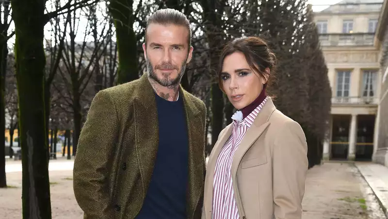 Victoria Beckham criticizes David Beckham's choice of shoes.