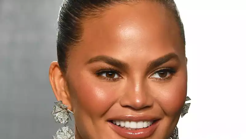 Chrissy Teigen says her third pregnancy is "more difficult" than her first two.