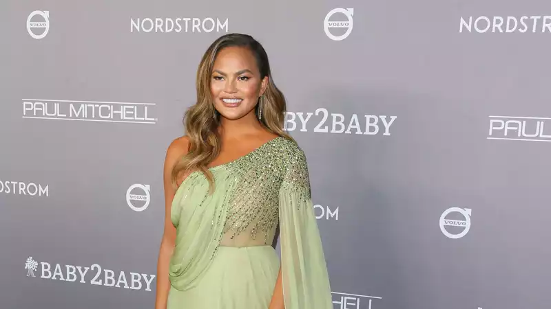 Chrissy Teigen shares photos of her implant removal surgery.