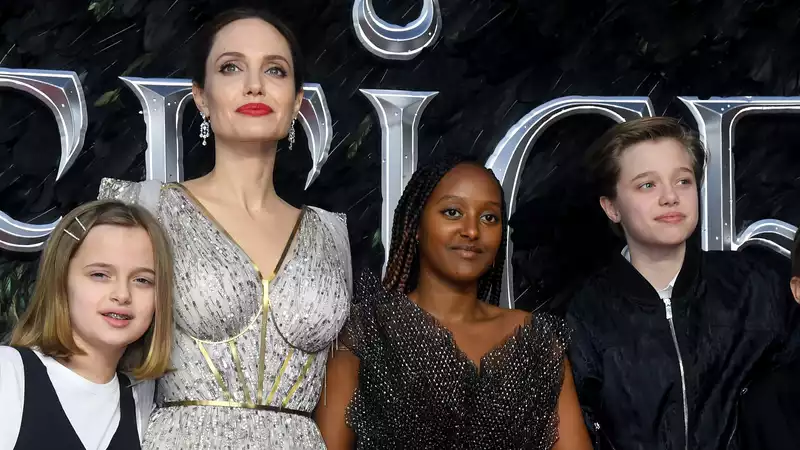 Angelina Jolie acknowledges white privilege while raising black children.