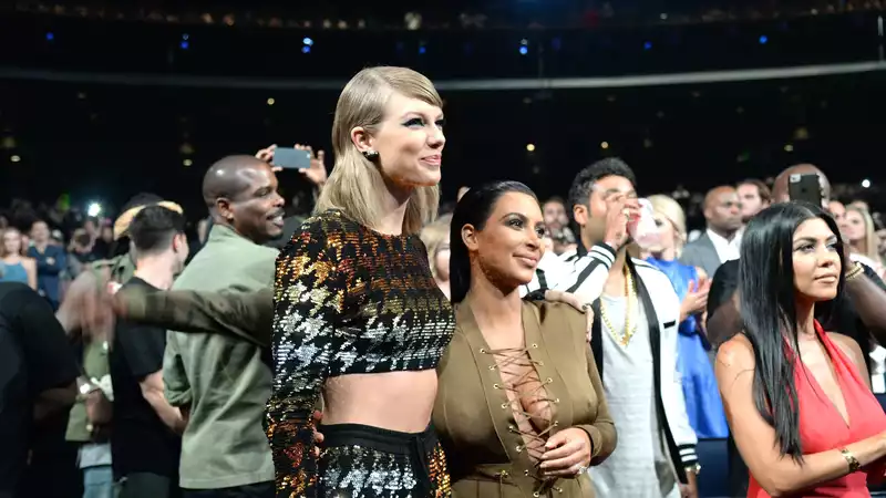 Taylor Swift casually cares for Kim Kardashian and Katy Perry on Instagram.