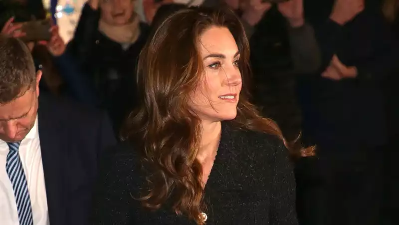 Kate Middleton coordinates glittery heels and clutch bag at the theater