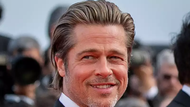 Brad Pitt runs home after first kiss