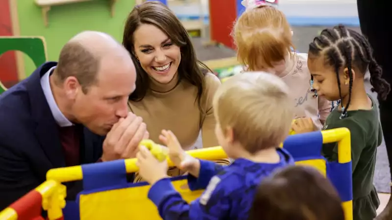 Prince William and Princess Kate share a sweet moment with a girl dressed as a princess.