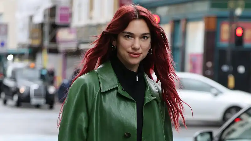 Dua Lipa Test Drives No Pan Trend in the London Rain