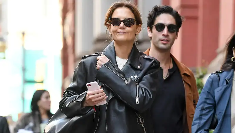 Katie Holmes enhances her wardrobe staples with a moto jacket