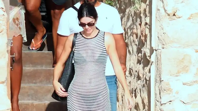 Kendall Jenner enjoys the Ibiza sun in a sheer sundress and $650 flip flops