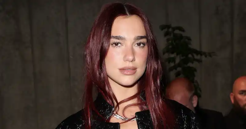 Dua Lipa wears vintage crochet cover-up over metallic string bikini