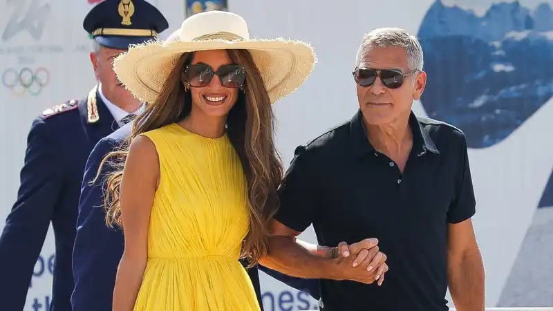 Amal Clooney, in a yellow sundress at the Venice International Film Festival, is committed to the “Eurocore” aesthetic.