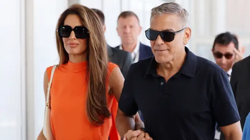 Amal Clooney's Citrus September jumpsuit tells the story of the end of summer in Brat Green