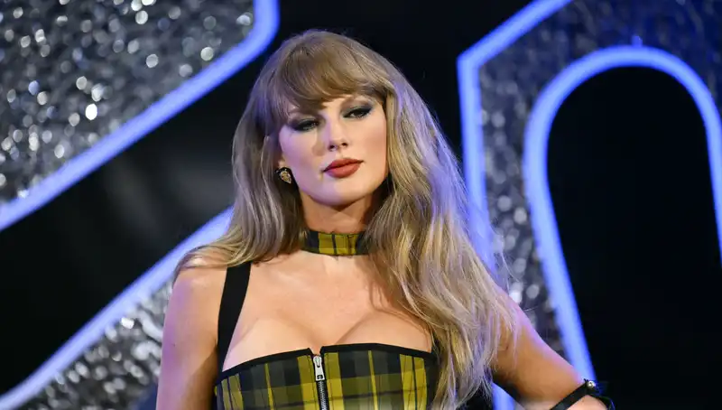 Taylor Swift stuns on the red carpet at the 2024 VMAs in a tartan check Dior corset and cape