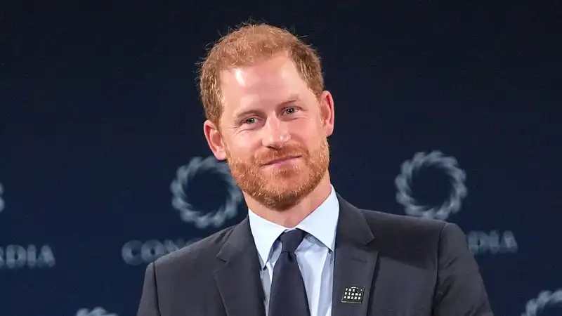 Prince Harry reveals how being a “second father” has changed him.