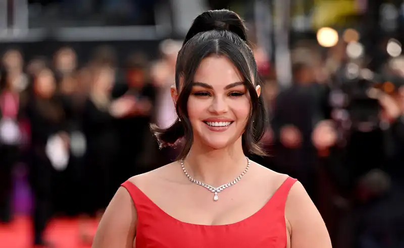 Selena Gomez Finally Defeats Little Black Dress Regulars in Cherry Red Ball Gown in London