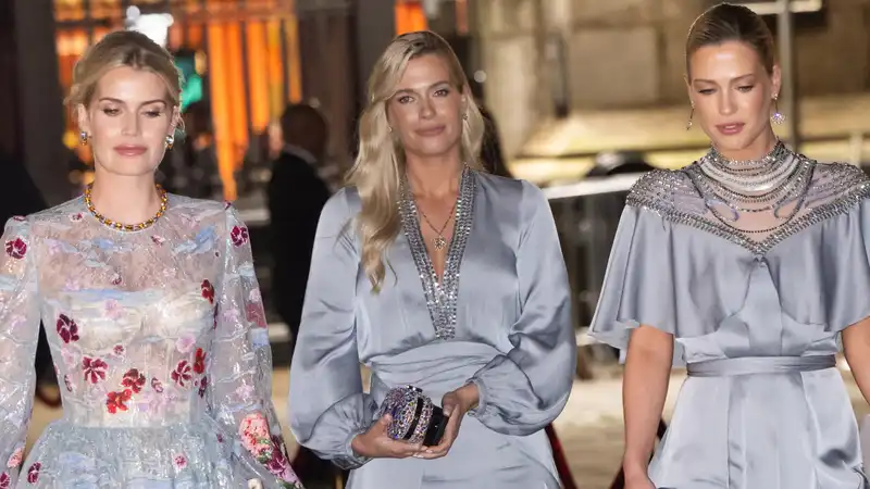 Princess Diana's nieces, Lady Amelia, Eliza Spencer and Kitty Spencer, in their icy blue gowns, support Prince William at the Center Point Awards