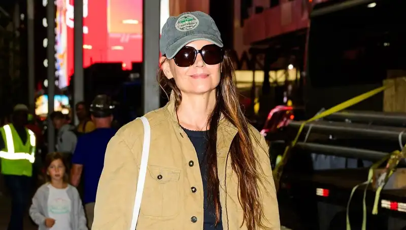 Katie Holmes' Broadway commuting essentials: a classic fall shacket and burgundy ballet shoes