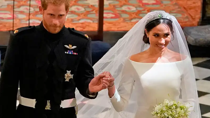 Meghan Markle opens up about her “beautiful friendship” with her wedding dress designer.