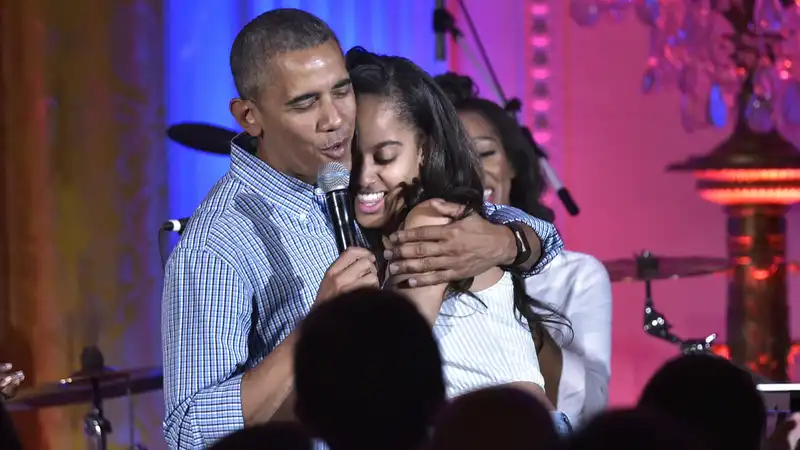 President Barack Obama reacts to his daughter Malia abandoning her professional last name.