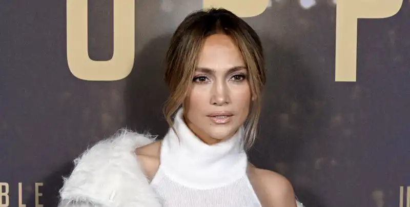 Jennifer Lopez is the mood board of winter brides everywhere dressed in immaculate sweater dresses and coats