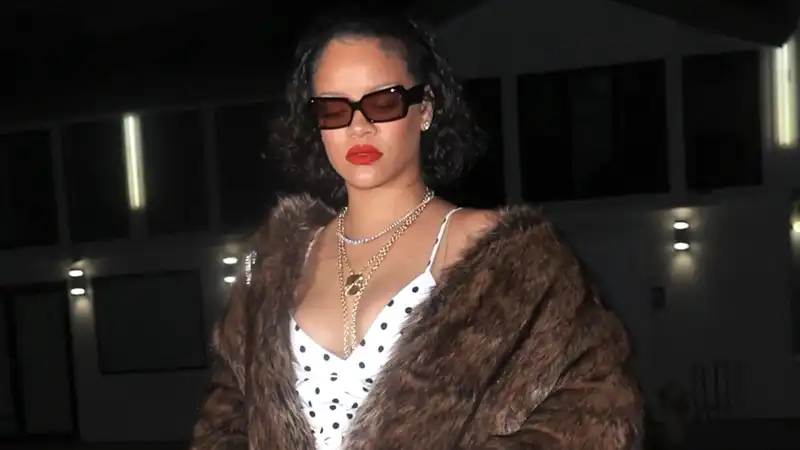 Rihanna Out - Rihanna herself in a polka dot dress with a statement fur coat