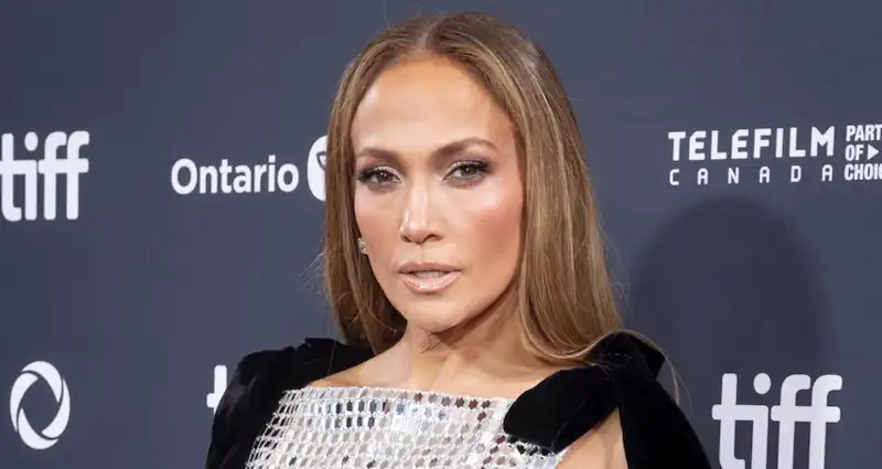 Jennifer Lopez even Bedazzled manicure and her low-Cut Sequins Revenge dress