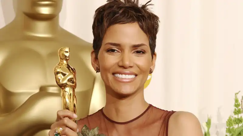 Halle Berry re-wears the 2002 Oscar naked dress on the runway at Ellie Saab