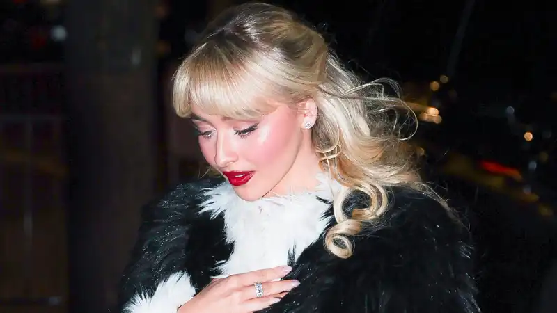 Sabrina carpenter's red lips and frosty highlighter are so Taylor Swift coded