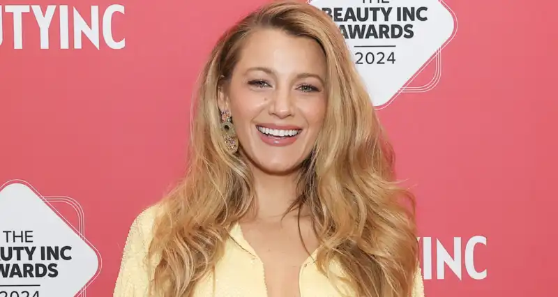 Blake Lively coordinates a butter yellow Chanel bag with a sequined suit from Sergio Hudson's first menswear collection.